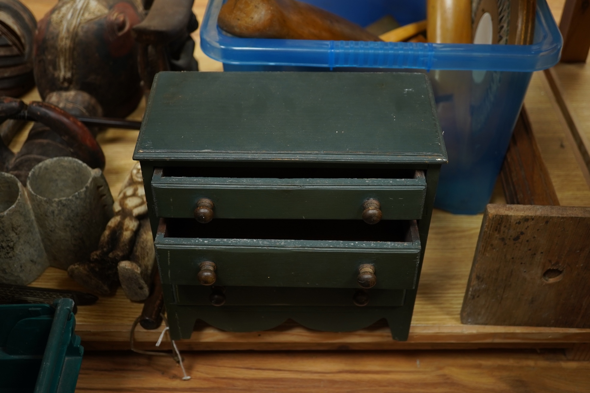 A painted pine miniature chest of drawers, various boot trees etc, chest 26cm x 26cm